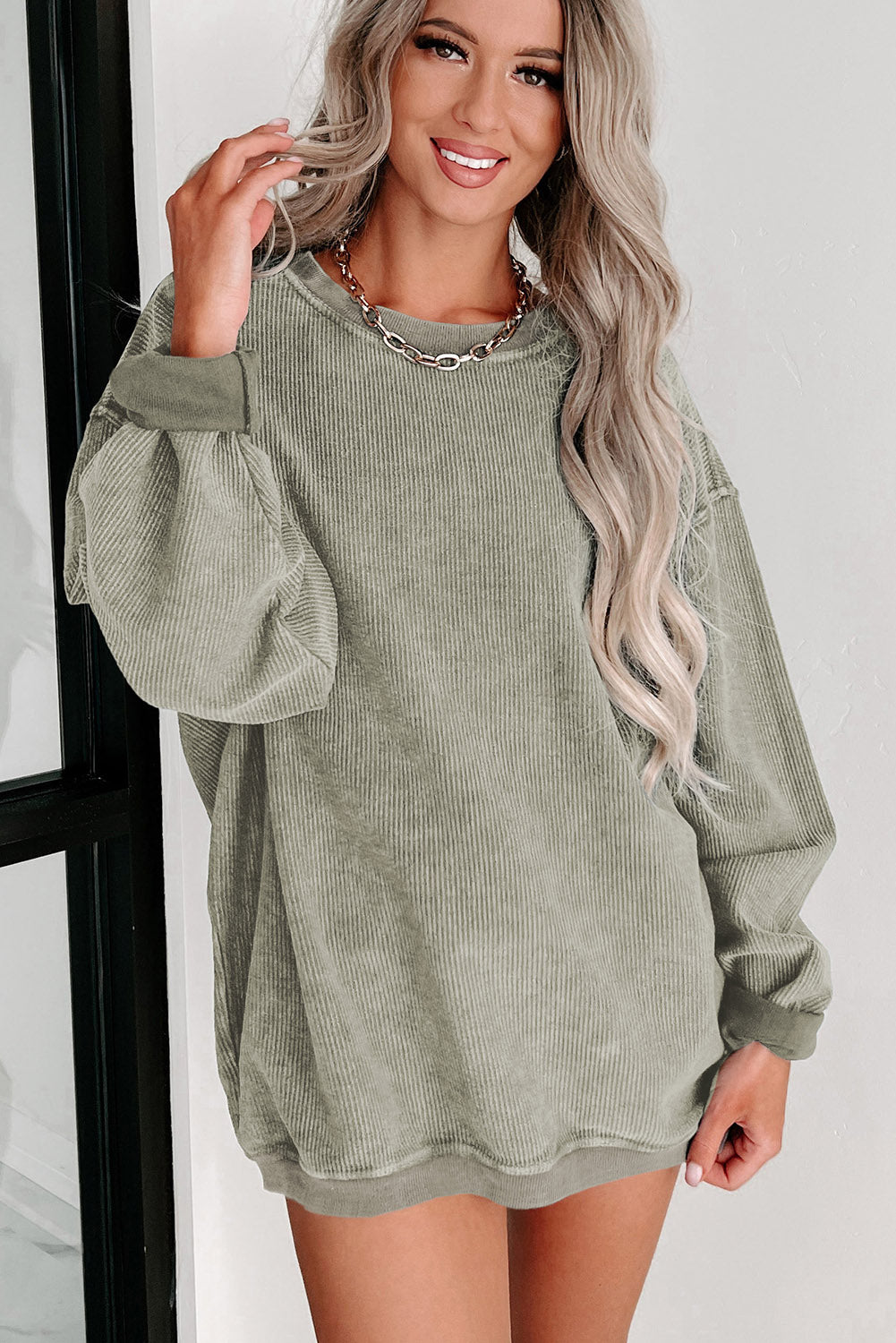 Sudadera con cuello redondo y punto acanalado liso de color gris liso
