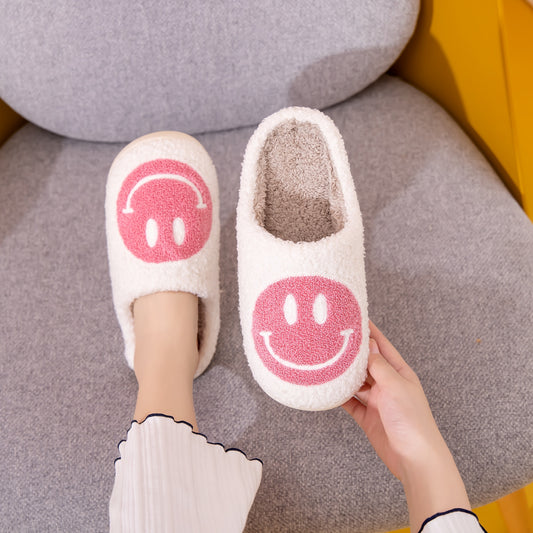 Pantuflas con cara sonriente de Melody