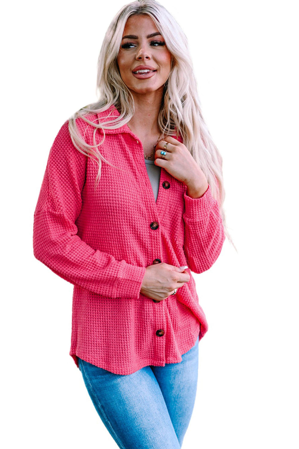 Blusa de punto gofre con botones en el frente y bolsillos de color rosa intenso