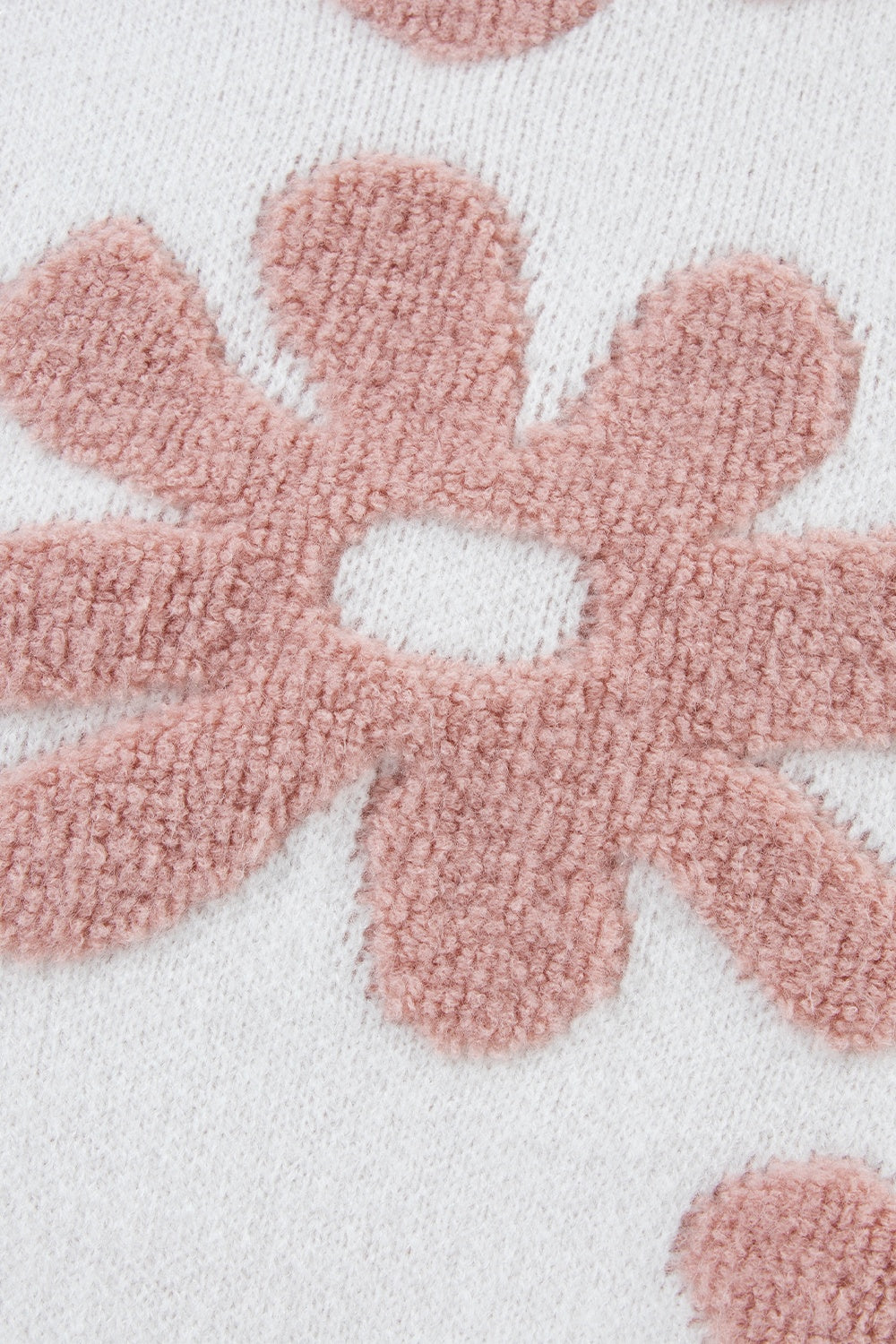 Blusa de punto con cuello redondo y manga larga con flores