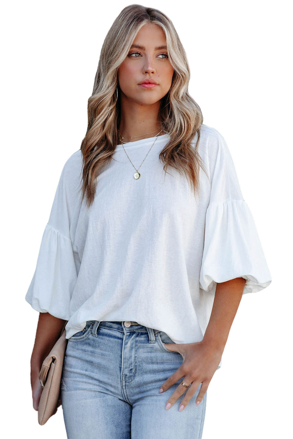 Blusa informal de color blanco liso con mangas abullonadas