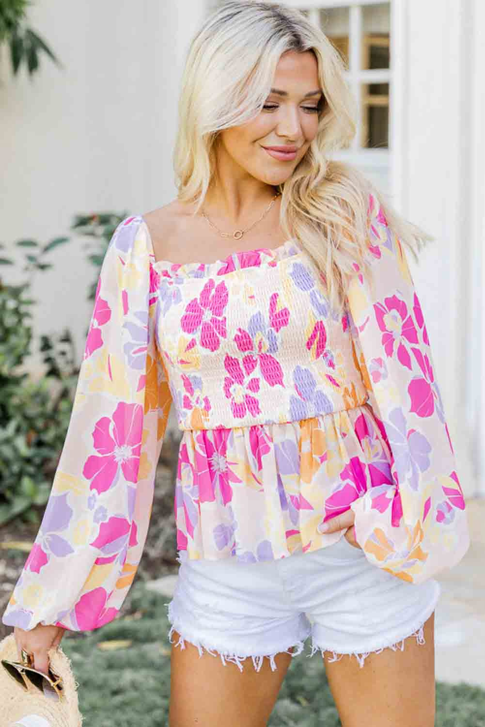 Blusa peplum con escote cuadrado fruncido y estampado floral en color rosa