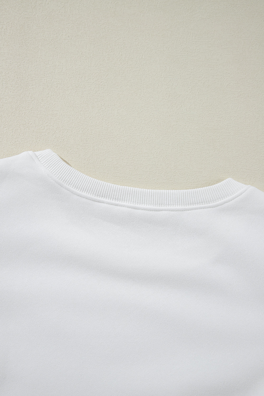 Sudadera con cuello redondo y mangas abullonadas de color blanco liso