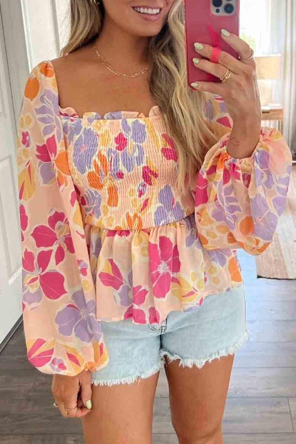 Blusa peplum con escote cuadrado fruncido y estampado floral en color rosa