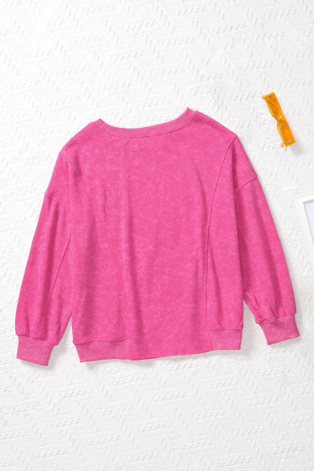 Sudadera informal holgada con efecto desgastado de color rosa