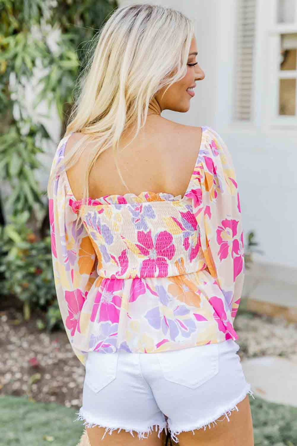 Blusa peplum con escote cuadrado fruncido y estampado floral en color rosa