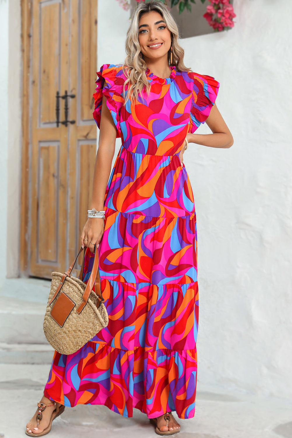 Vestido largo con volantes y cintura alta con estampado abstracto en color naranja