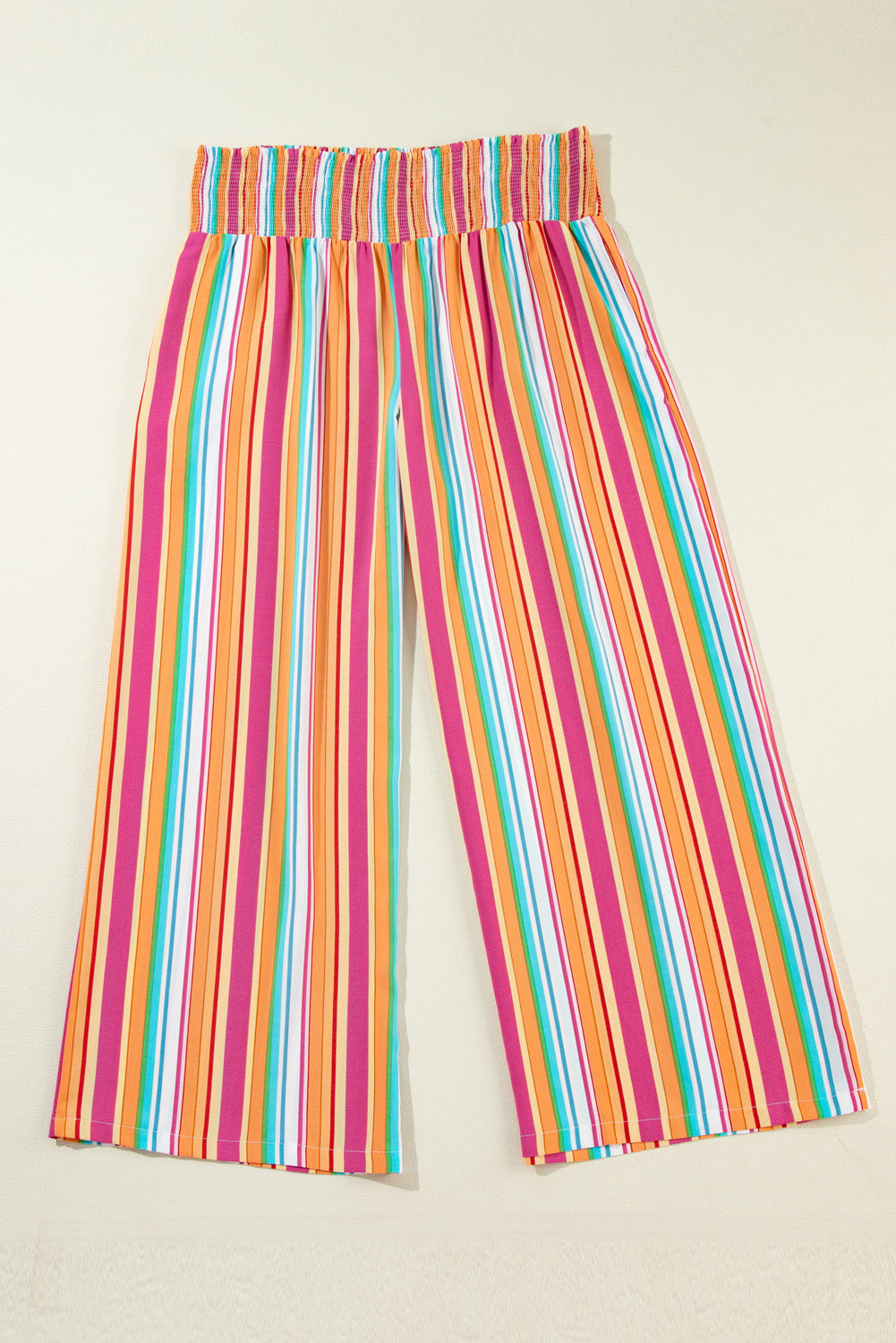 Pantalones holgados con cintura fruncida y rayas bohemias en color naranja de talla grande