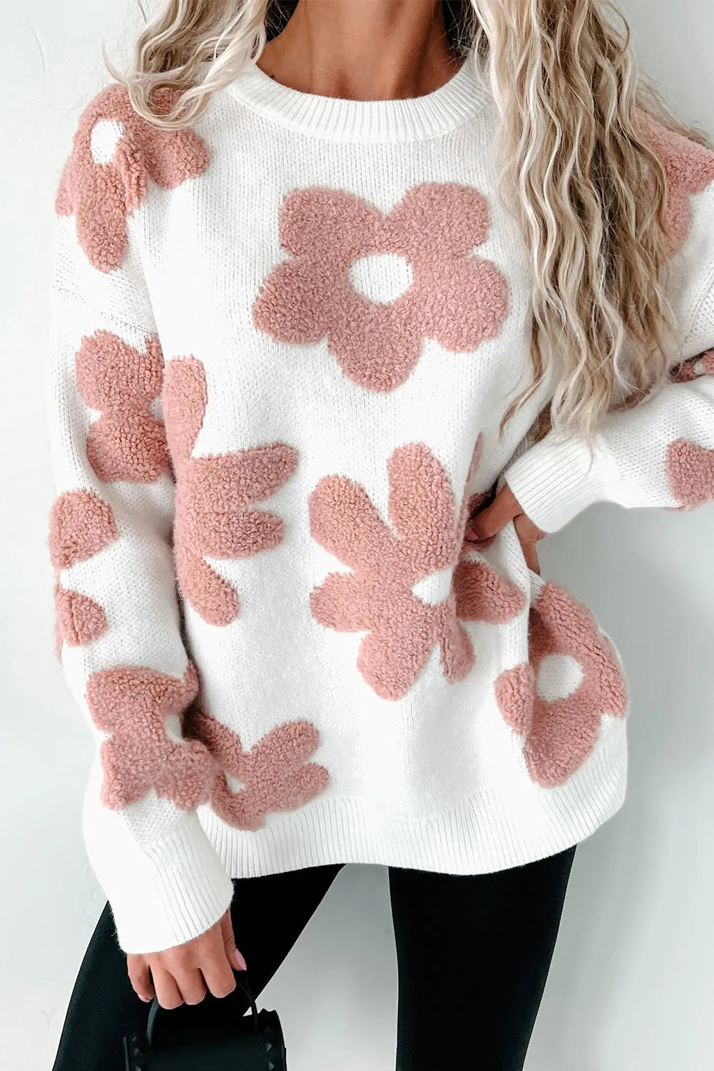 Blusa de punto con cuello redondo y manga larga con flores