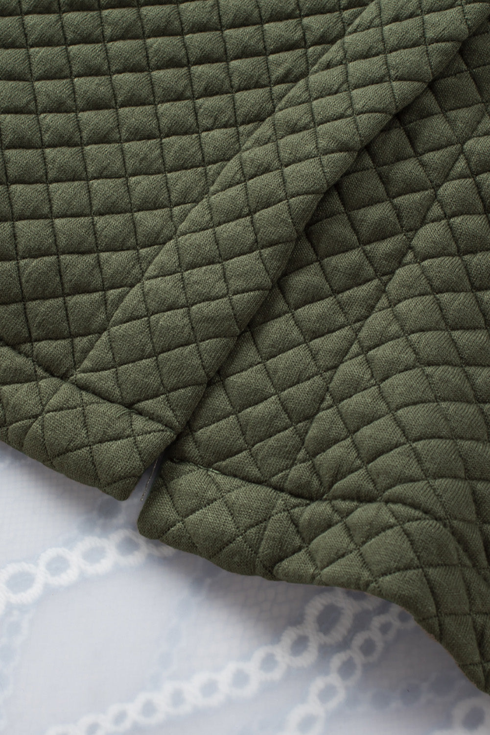 Chaqueta con botones y bolsillos con textura de celosía verde