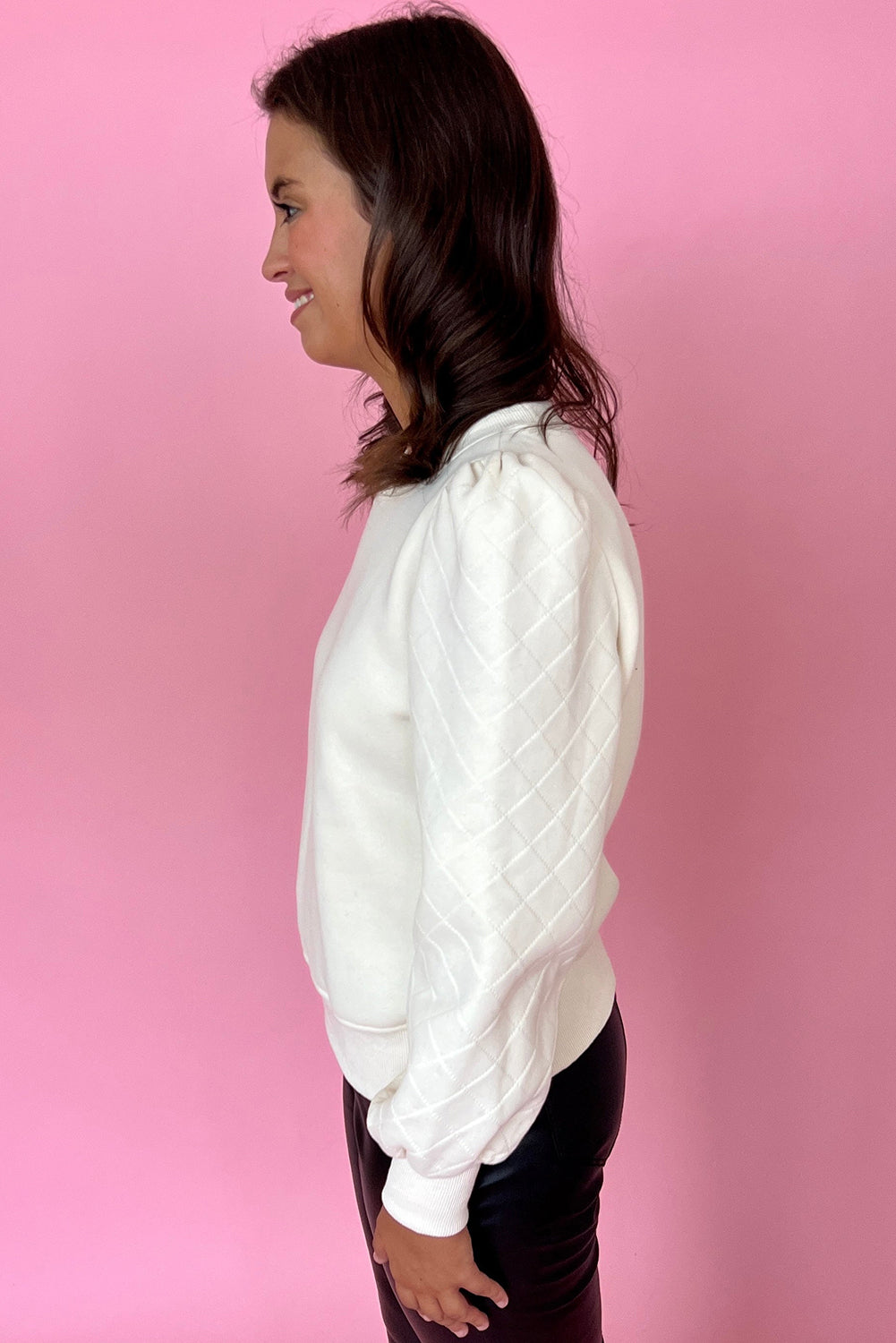 Sudadera con cuello redondo y mangas abullonadas de color blanco liso