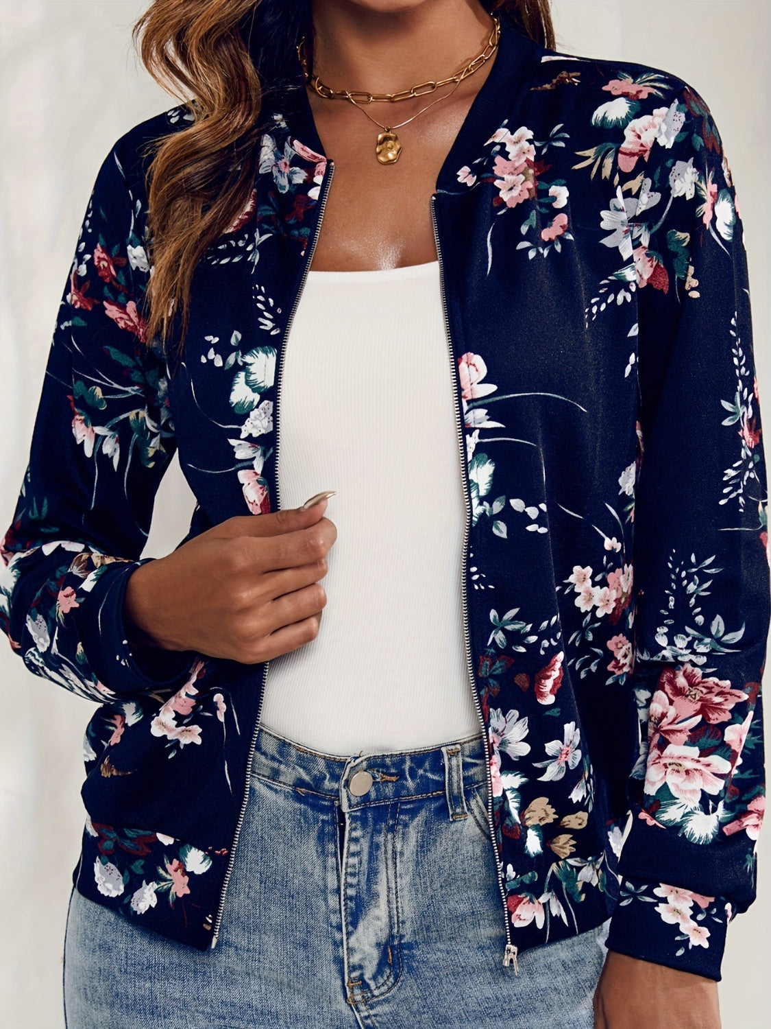 Chaqueta con cremallera y estampado floral