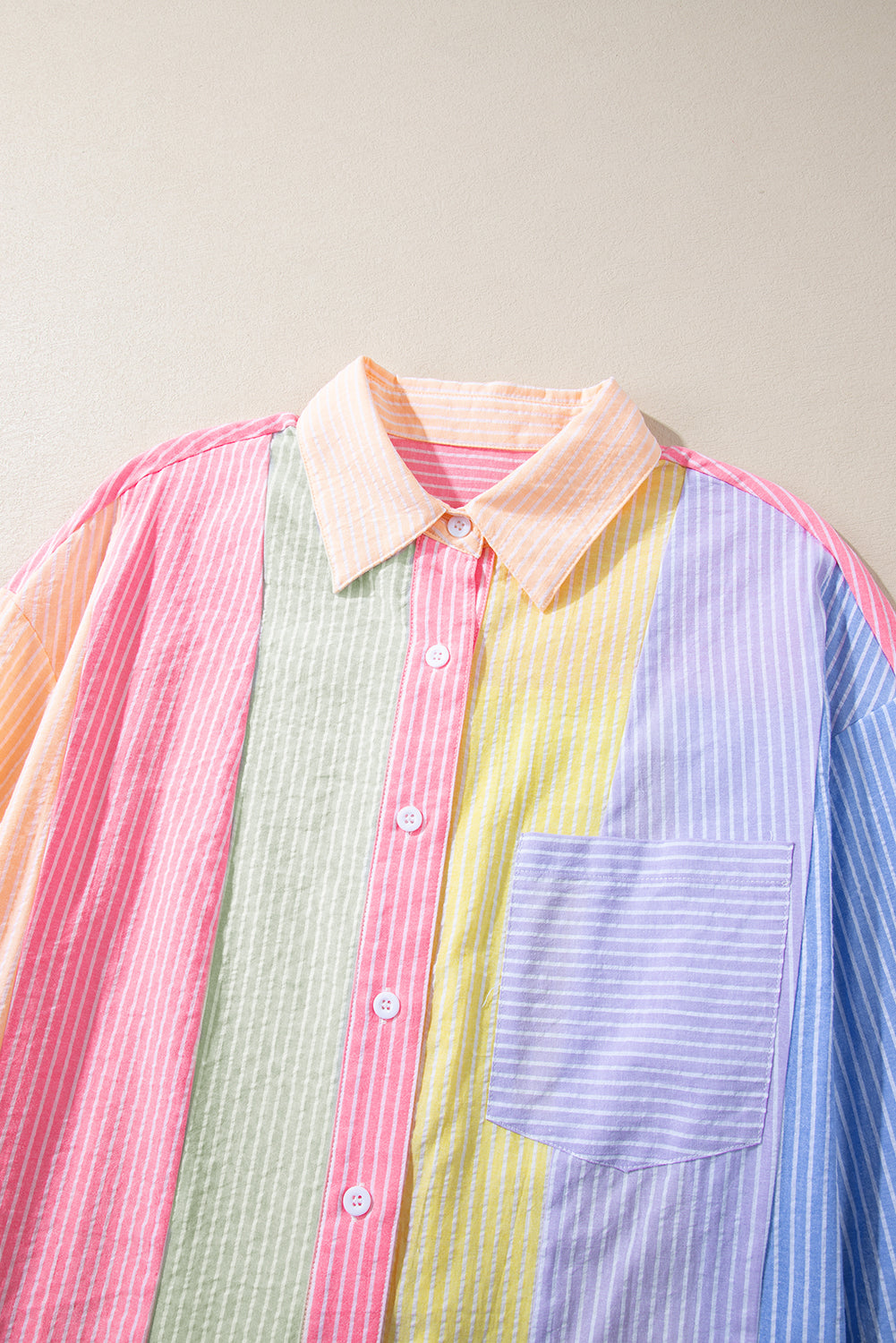 Camisa oversize con botones y bloques de color de rayas rosas