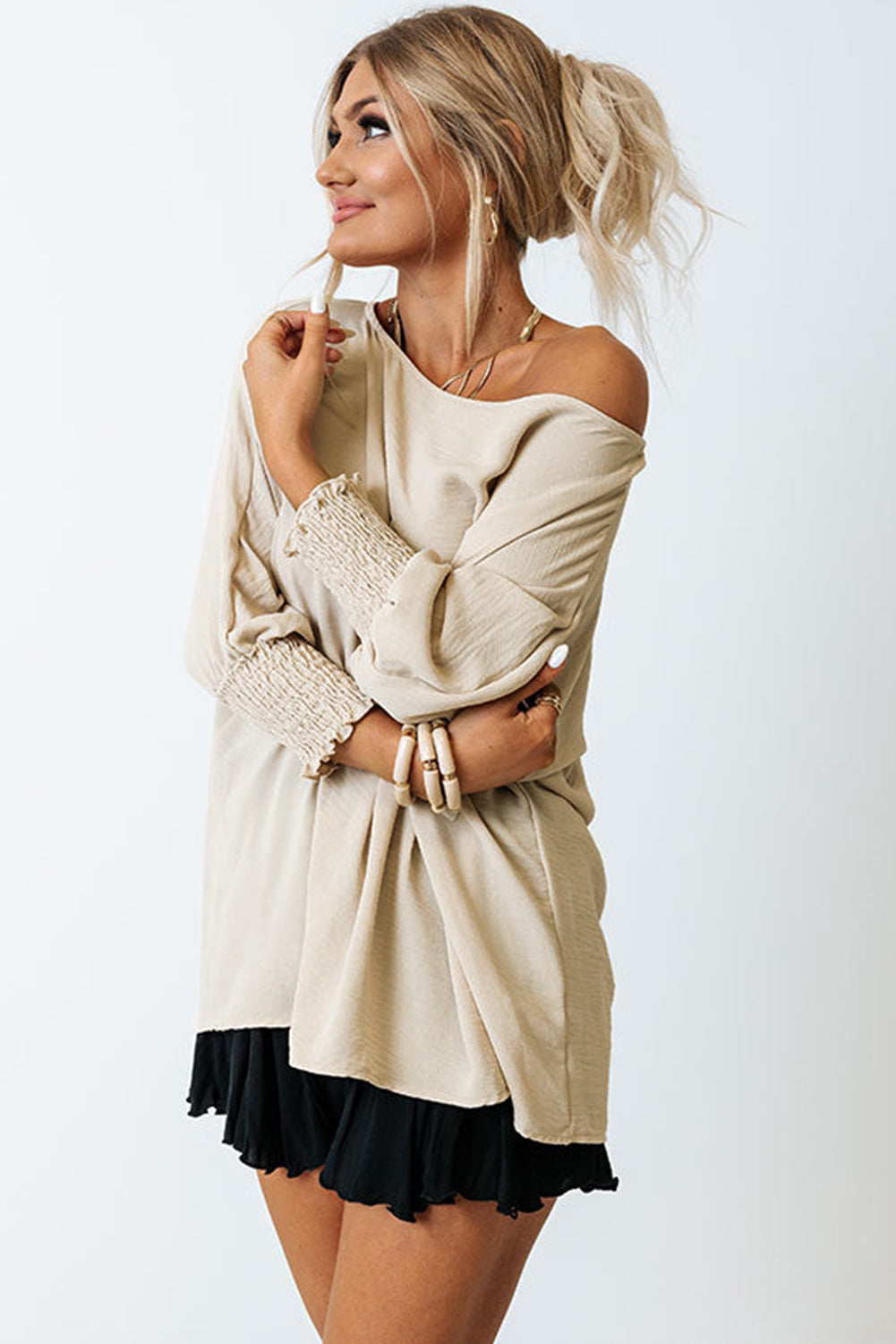 Blusa informal de media manga con puños fruncidos, color blanco, lisa