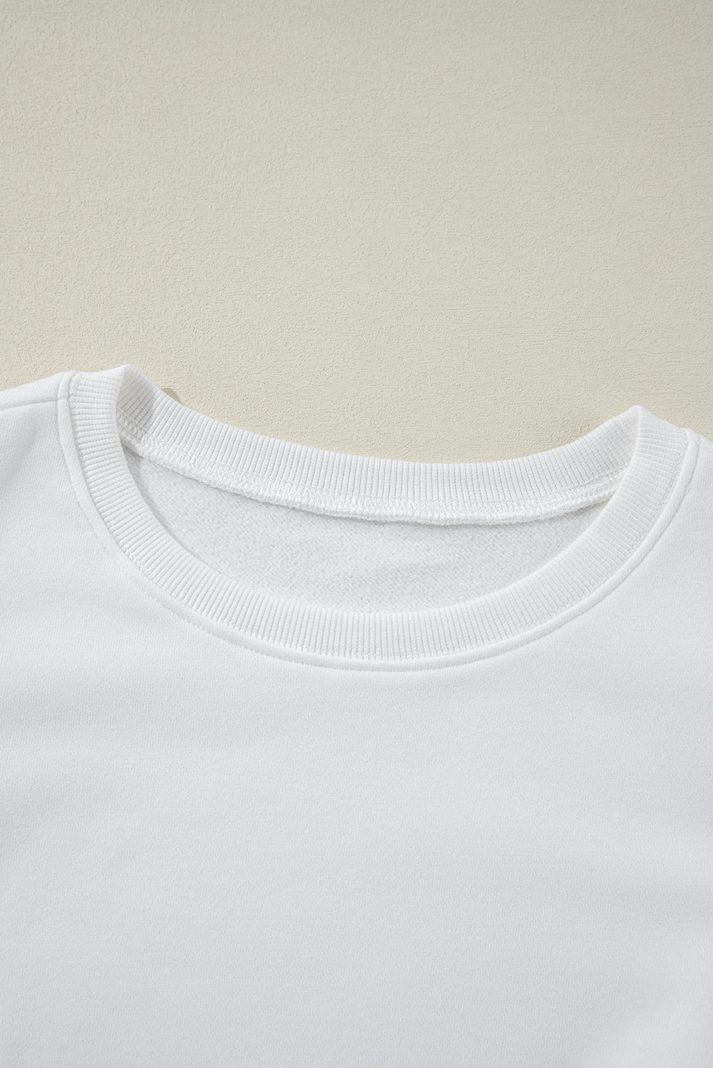 Sudadera con cuello redondo y mangas abullonadas de color blanco liso