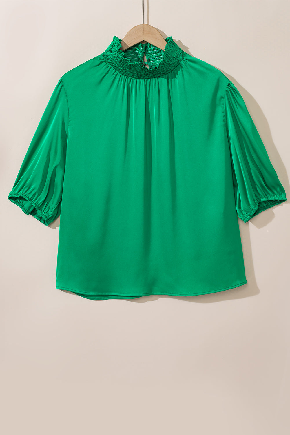 Blusa de cuello alto fruncido con mangas abullonadas en color verde mar de talla grande