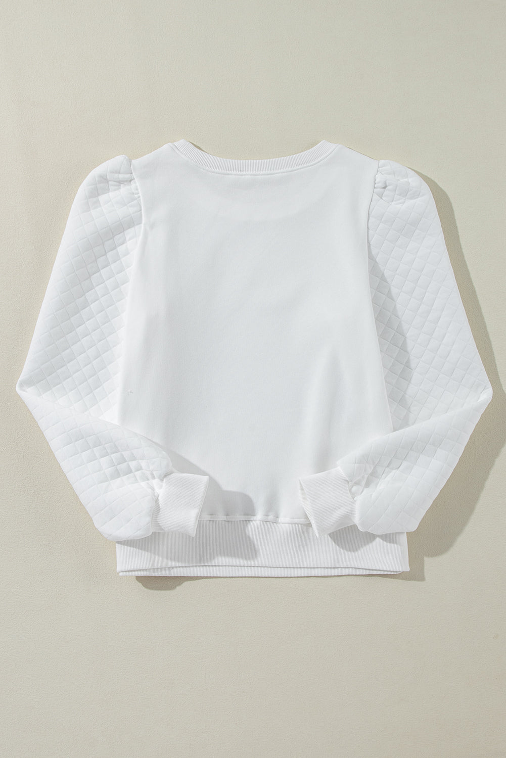 Sudadera con cuello redondo y mangas abullonadas de color blanco liso