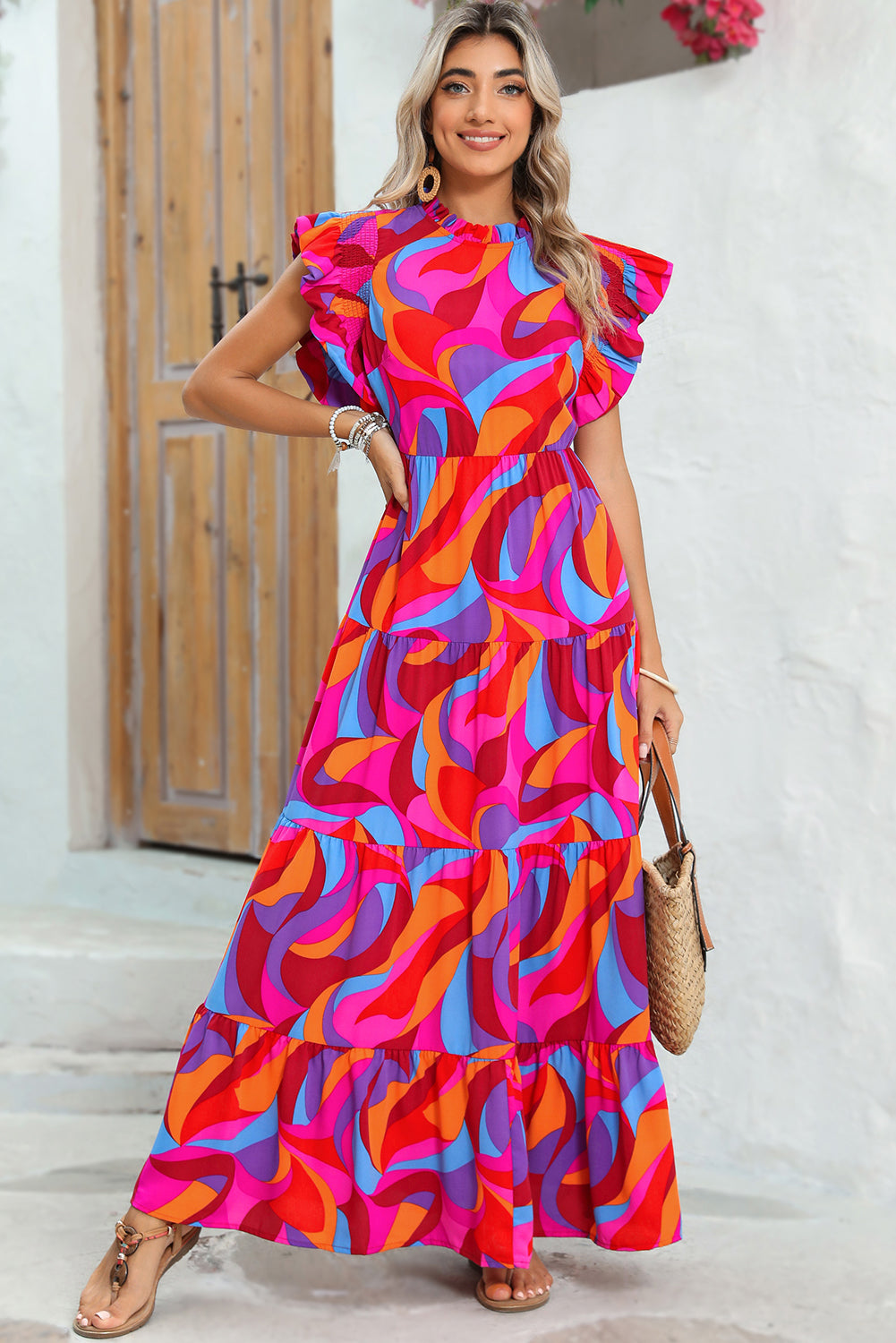 Vestido largo con volantes y cintura alta con estampado abstracto en color naranja