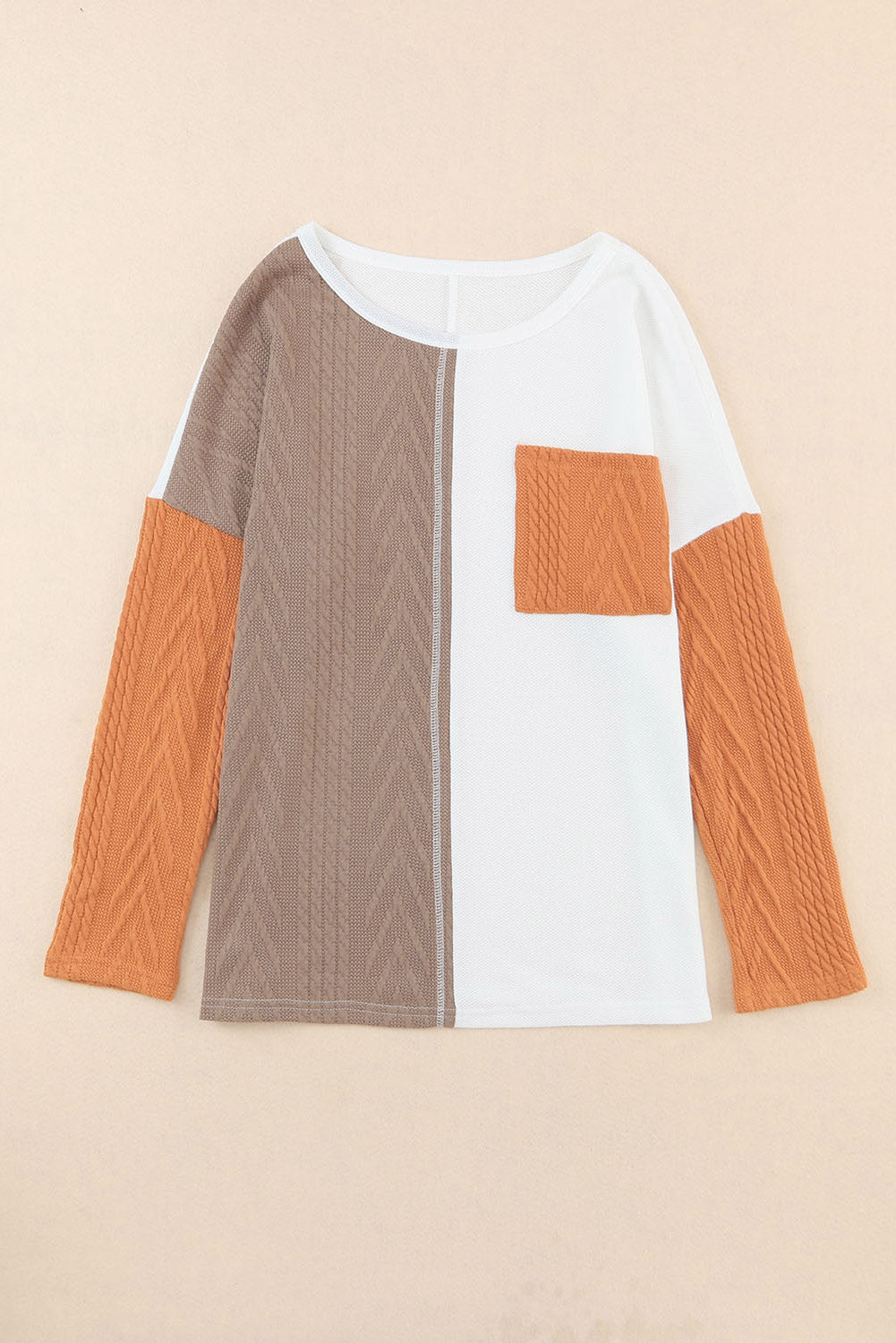 Top de punto texturizado con bolsillo en el pecho y manga larga en color naranja