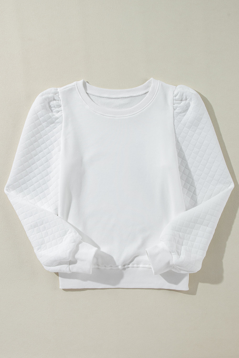 Sudadera con cuello redondo y mangas abullonadas de color blanco liso