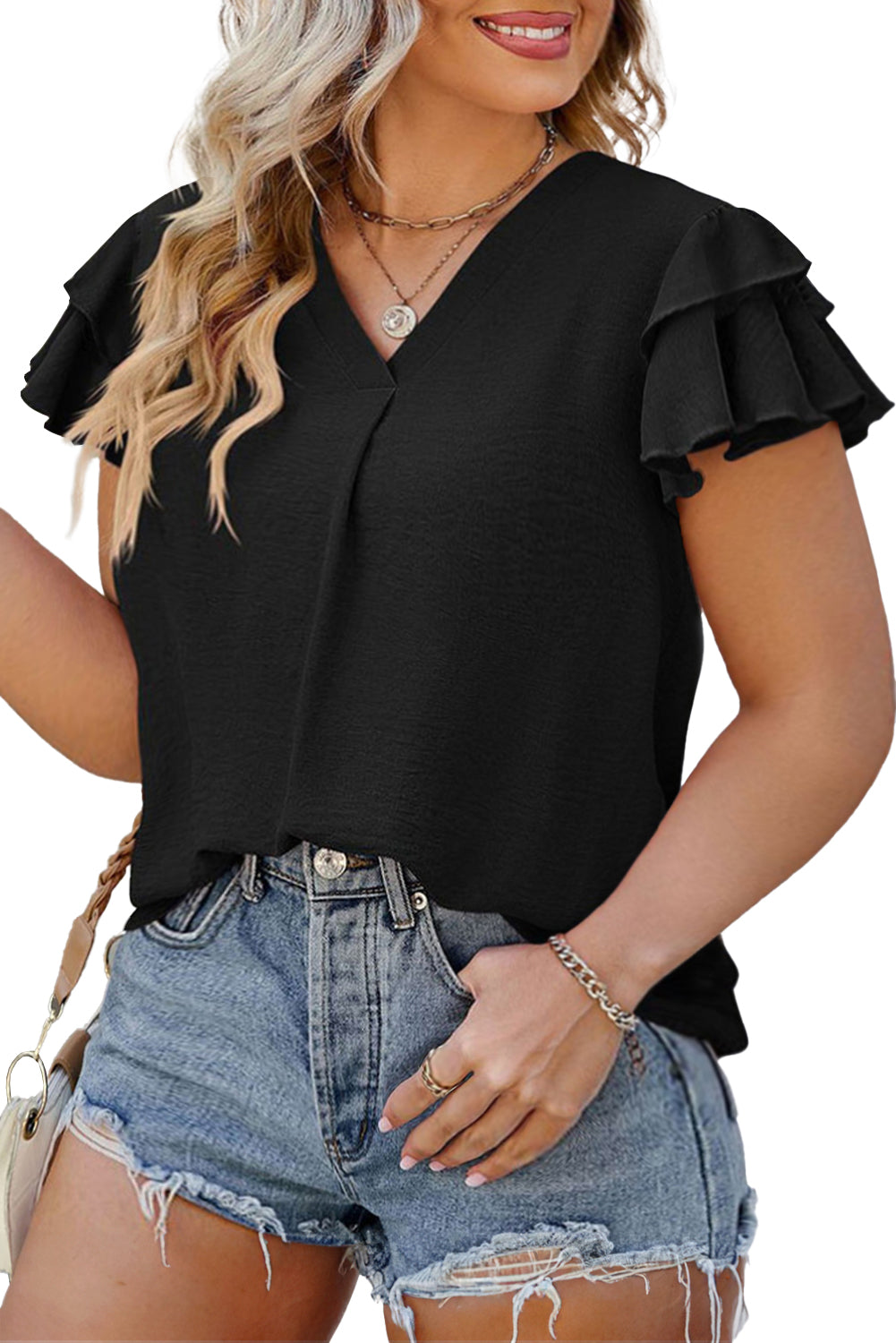 Blusa negra con cuello en V y mangas cortas con volantes en talla grande