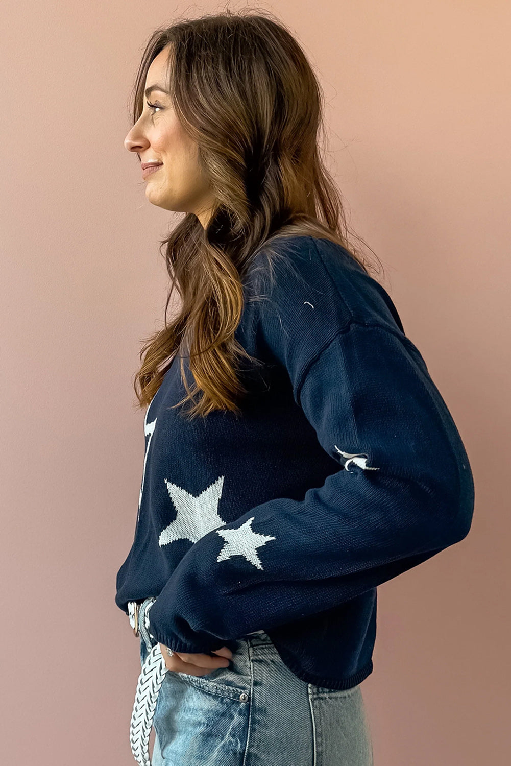 Suéter de punto trenzado con mangas caídas y estampado de estrellas en color azul marino