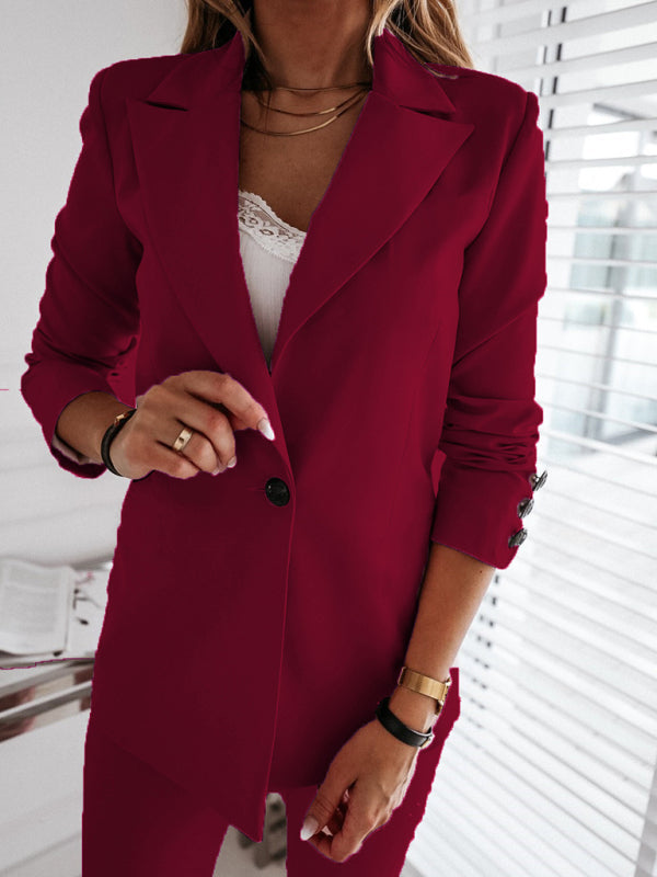 Chaqueta de traje con botones y cuello de traje de manga larga 