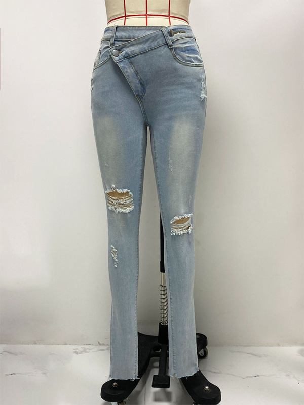 Asymmetrical button fly skinny jeans