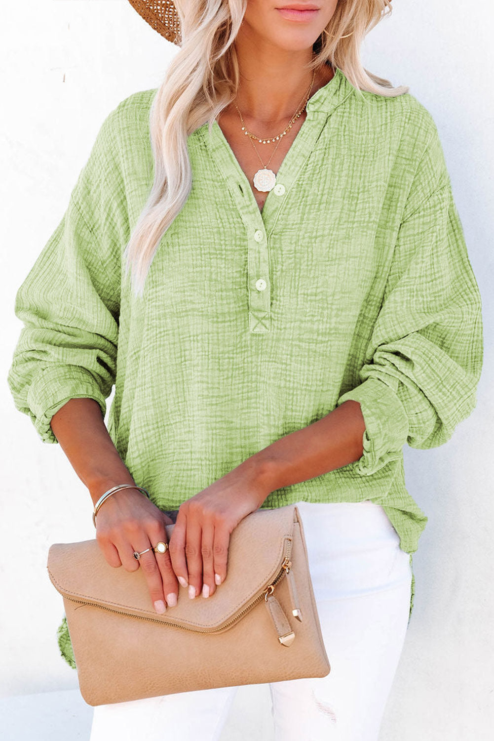 Blusa de manga larga abotonada