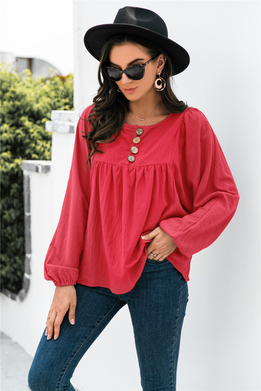 Blusa con mangas globo y botones