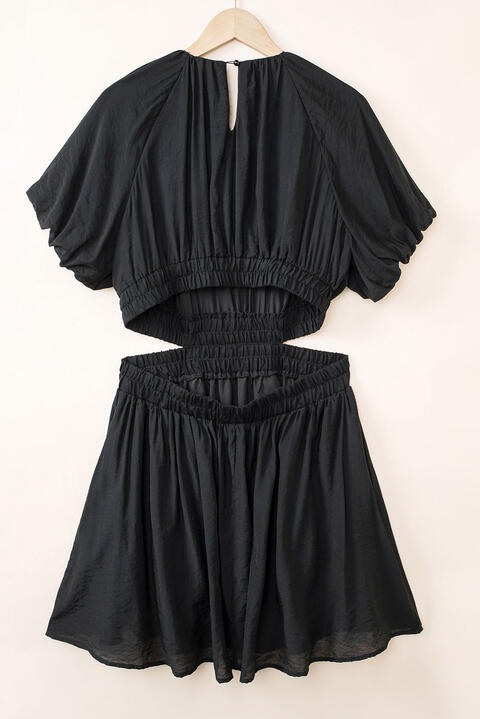 Vestido mini con escote redondo y aberturas