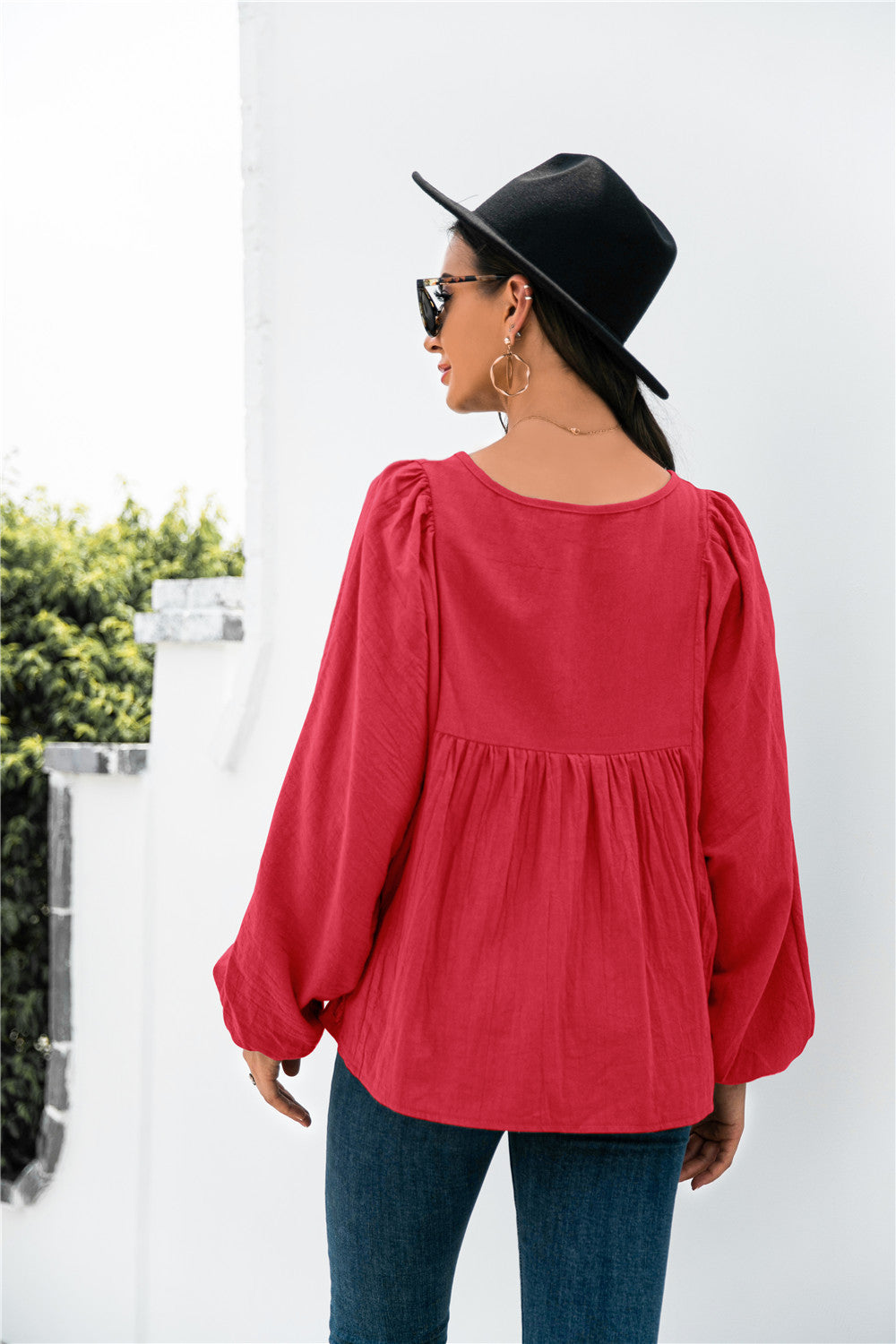 Blusa con mangas globo y botones